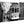 Black and white acrylic photo print featuring a tram on a busy city street