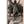 Direct print on wood of a statue with arms raised, tropical trees in background, outdoor setting