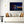 Tableau mural représentant un port de nuit illuminé, avec reflets colorés sur l’eau, terrasse au bord de mer et ciel étoilé- Tableau plexiglas photographie ESPOIR PHOTOS